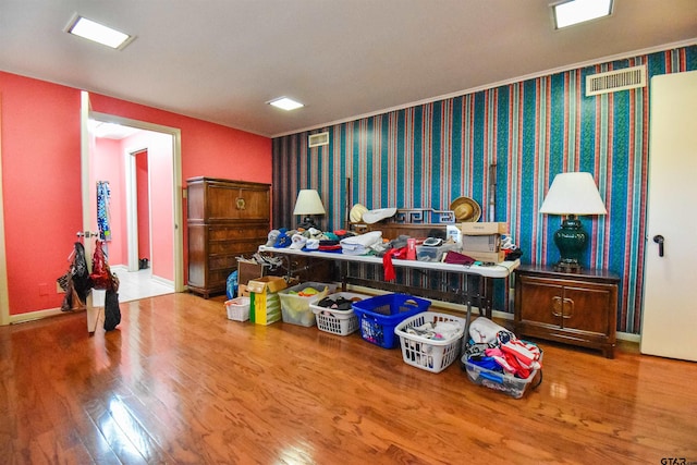 miscellaneous room with hardwood / wood-style flooring