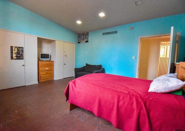 bedroom with vaulted ceiling