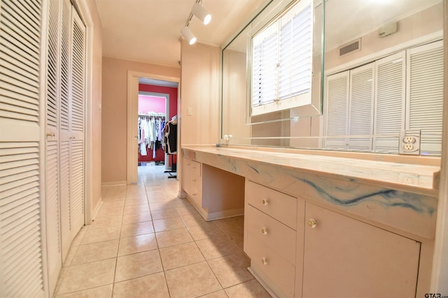 bathroom featuring tile patterned flooring