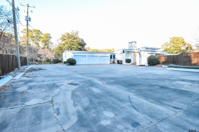 exterior space with a garage