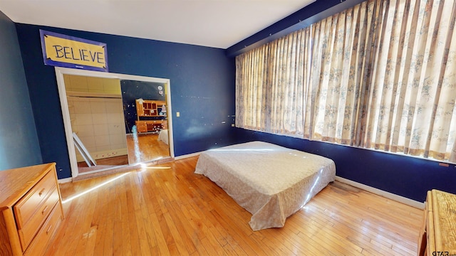 bedroom featuring light hardwood / wood-style flooring