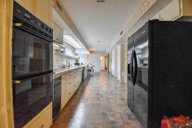 kitchen featuring black appliances