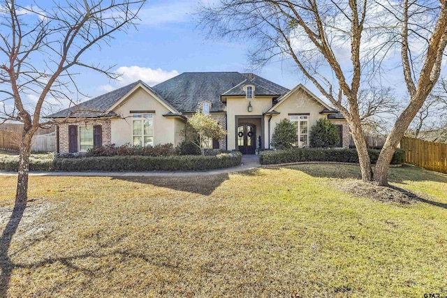 view of front of house with a front lawn