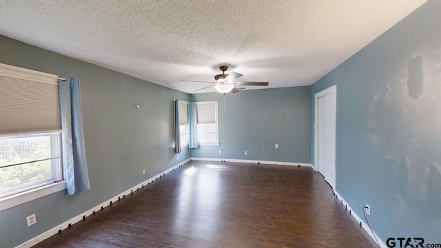280 Dickard St, Hawkins, TX 75765 - spare room with a textured ceiling, wood finished floors, baseboards, and ceiling fan