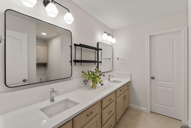 1036 High Meadow Dr, Mount Vernon, TX 75457 - bathroom with double vanity, tile patterned floors, baseboards, and toilet