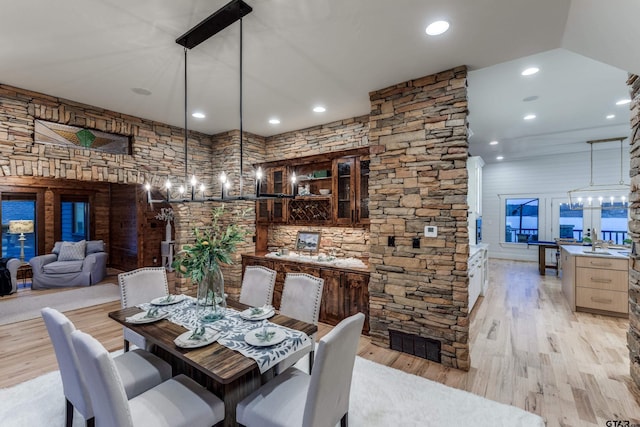 dining room featuring recessed lighting, light wood-style floors, and visible vents