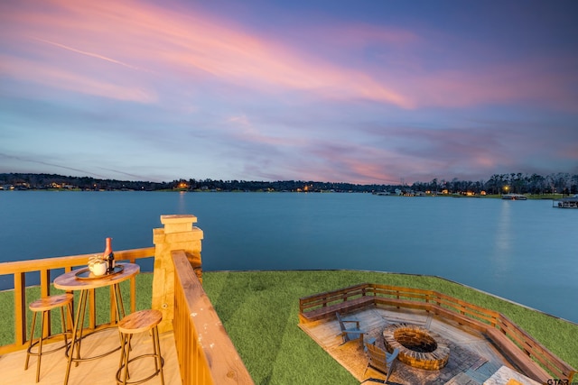 water view with an outdoor fire pit