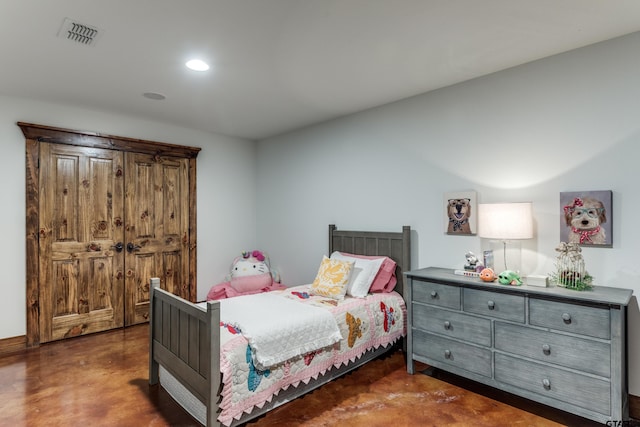 bedroom with recessed lighting, visible vents, and concrete flooring