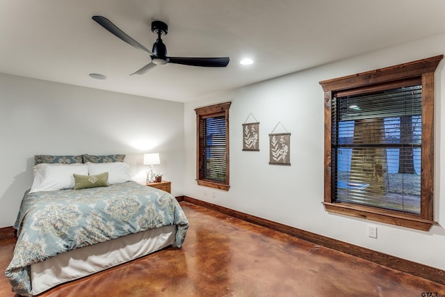 bedroom with recessed lighting, a ceiling fan, baseboards, and concrete flooring