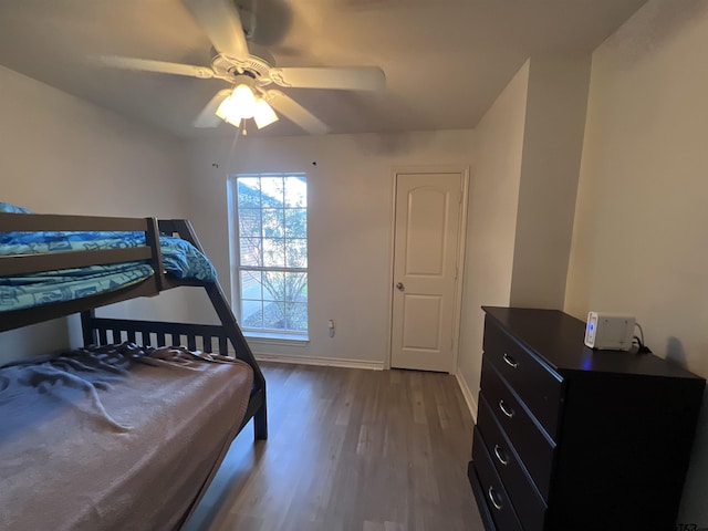 bedroom featuring wood-type flooring and ceiling fan