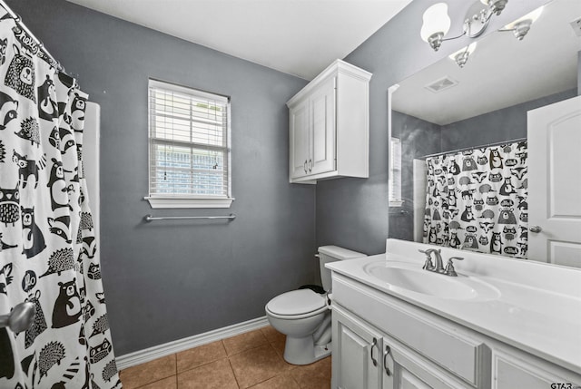 bathroom with walk in shower, tile patterned floors, a chandelier, toilet, and vanity