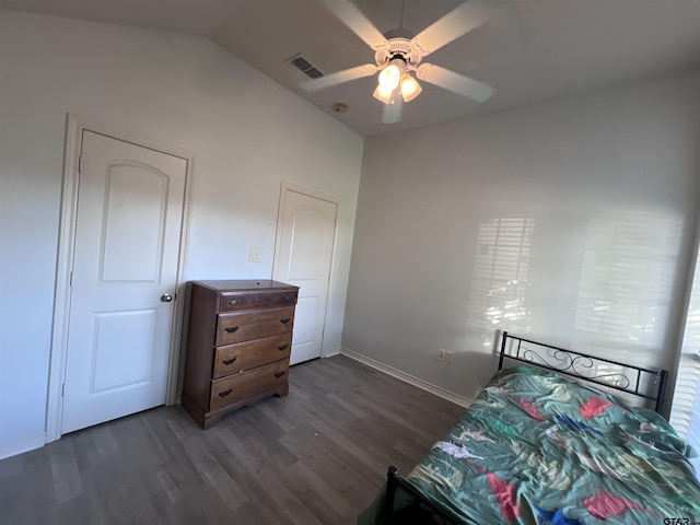 bedroom featuring vaulted ceiling, ceiling fan, and dark hardwood / wood-style floors