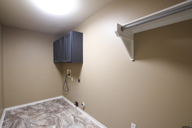 5878 Palo Pinto Dr, Tyler, TX 75707 - washroom with gas dryer hookup, electric dryer hookup, hookup for a washing machine, light marble finish floors, and cabinet space