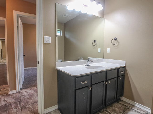 5878 Palo Pinto Dr, Tyler, TX 75707 - bathroom with vanity and baseboards
