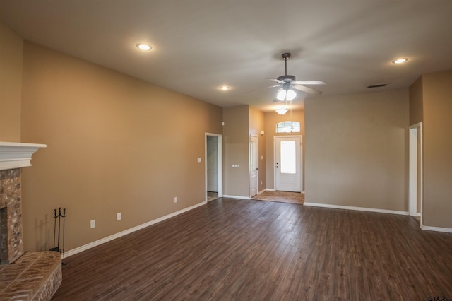 5878 Palo Pinto Dr, Tyler, TX 75707 - unfurnished living room featuring a fireplace, a ceiling fan, dark wood-style floors, and recessed lighting
