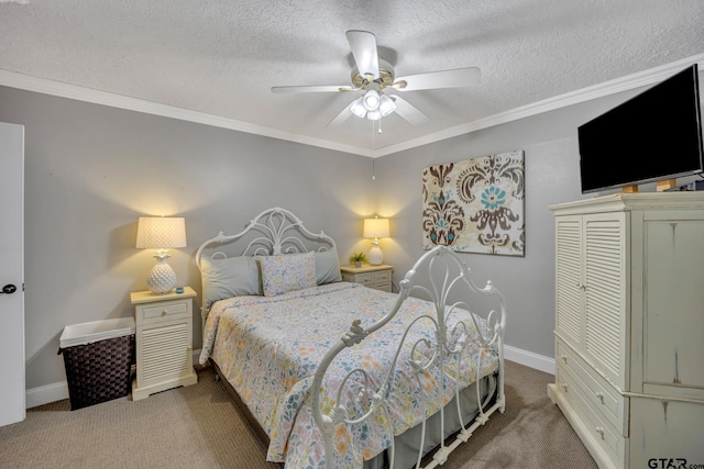 bedroom featuring ornamental molding, carpet, and a textured ceiling