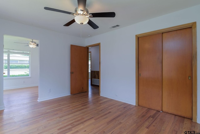 112 Lakeview St, Whitehouse, TX 75791 - unfurnished bedroom with light wood finished floors, a closet, and ceiling fan