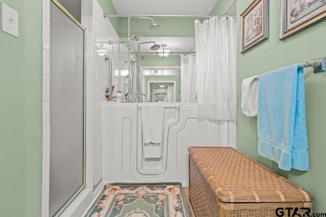 bathroom with a shower with shower curtain