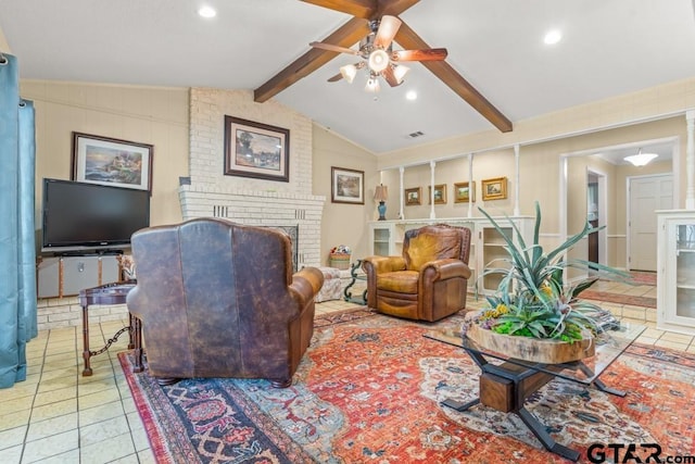 living room featuring a fireplace, ceiling fan, tile patterned floors, and lofted ceiling with beams