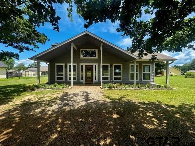 411 Cimarron Trl, Holly Lake Ranch, TX 75765 - photo 1