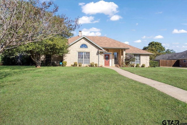 view of front of property with a front lawn