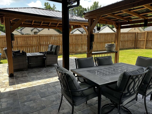19135 Ambrosia Dr, Flint, TX 75762 - fenced backyard featuring a gazebo, a patio, and outdoor dining area