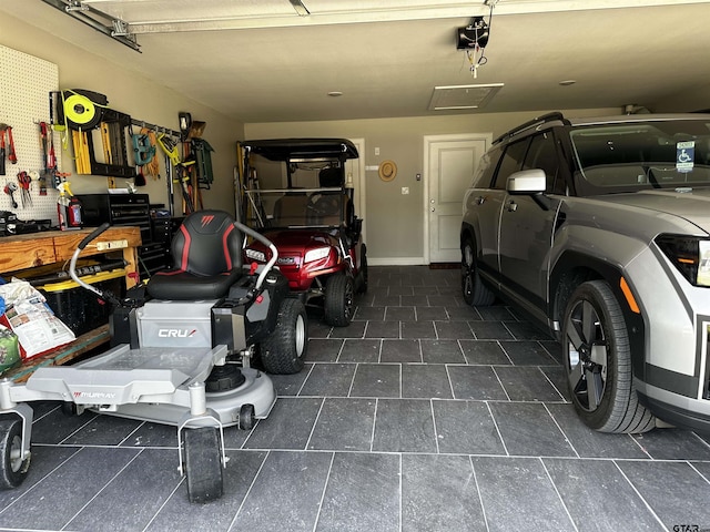 19135 Ambrosia Dr, Flint, TX 75762 - garage featuring a garage door opener
