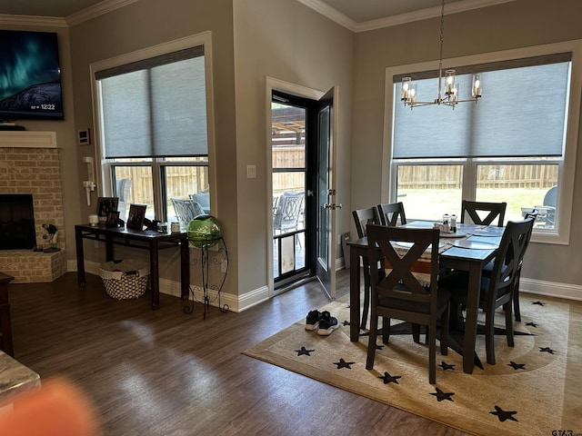 19135 Ambrosia Dr, Flint, TX 75762 - dining space featuring a chandelier, crown molding, healthy amount of natural light, and wood finished floors