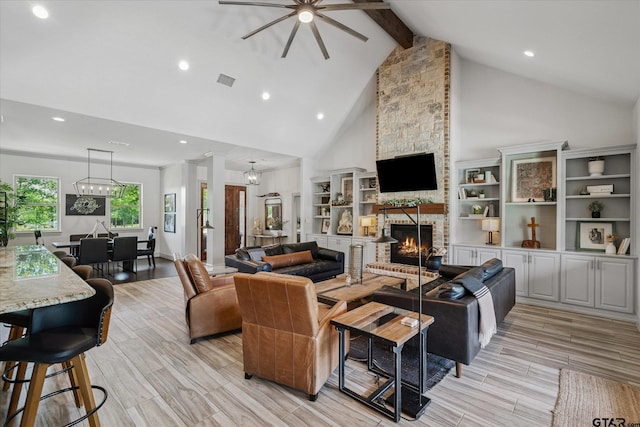 185 Vz County Road 2103, Canton, TX 75103 - living room featuring high vaulted ceiling, a fireplace, beam ceiling, a ceiling fan, and light wood-style flooring