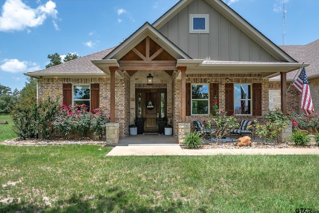 185 Vz County Road 2103, Canton, TX 75103 - craftsman house with brick siding, board and batten siding, roof with shingles, and a front yard