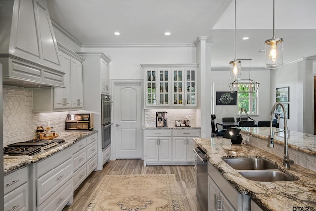 185 Vz County Road 2103, Canton, TX 75103 - kitchen with stainless steel appliances, decorative backsplash, light wood-style flooring, decorative light fixtures, and recessed lighting