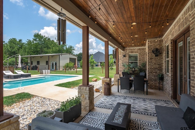 185 Vz County Road 2103, Canton, TX 75103 - view of patio / terrace featuring an outdoor pool, outdoor dining space, and an outdoor structure