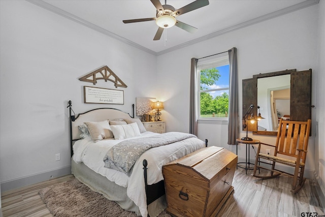 185 Vz County Road 2103, Canton, TX 75103 - bedroom featuring light wood-type flooring, ornamental molding, a ceiling fan, and a baseboard radiator
