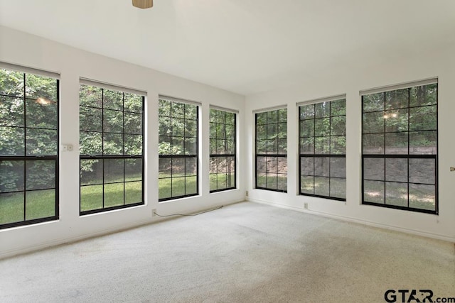 1656 Pineview Ln, Hideaway, TX 75771 - unfurnished sunroom featuring carpet and baseboards