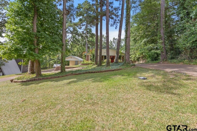 1656 Pineview Ln, Hideaway, TX 75771 - view of front facade featuring a front lawn