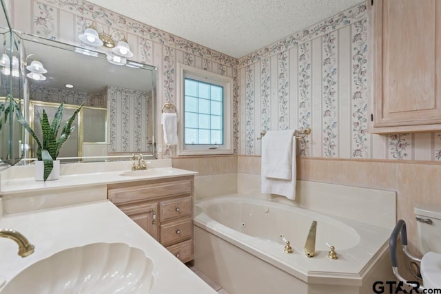 1656 Pineview Ln, Hideaway, TX 75771 - bathroom with wallpapered walls, a whirlpool tub, a stall shower, vanity, and a textured ceiling