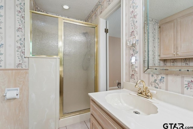 1656 Pineview Ln, Hideaway, TX 75771 - full bath with a textured ceiling, a stall shower, wallpapered walls, and vanity