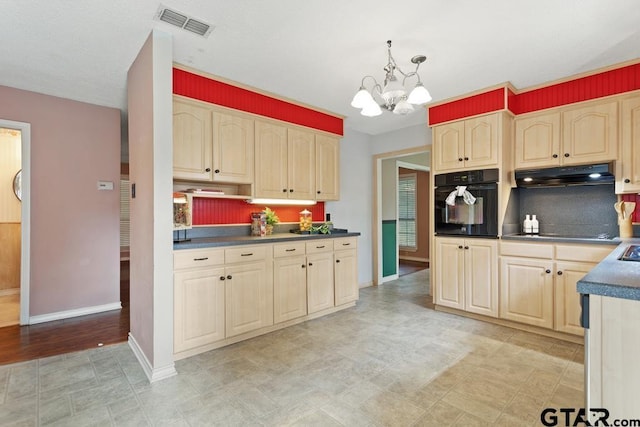 1656 Pineview Ln, Hideaway, TX 75771 - kitchen featuring black appliances, under cabinet range hood, dark countertops, a chandelier, and light brown cabinets