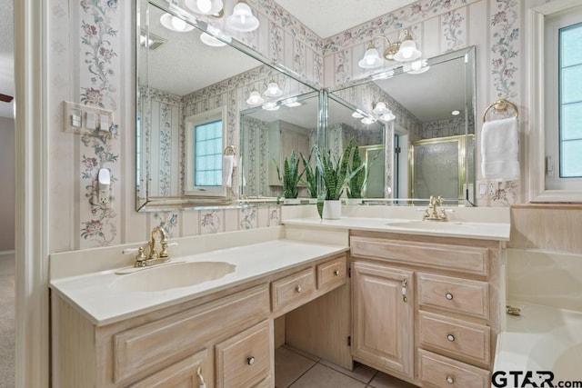 1656 Pineview Ln, Hideaway, TX 75771 - full bath with wallpapered walls, a shower stall, double vanity, a garden tub, and tile patterned floors