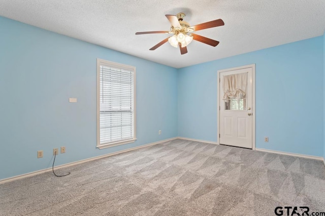 1656 Pineview Ln, Hideaway, TX 75771 - carpeted spare room featuring ceiling fan and a textured ceiling
