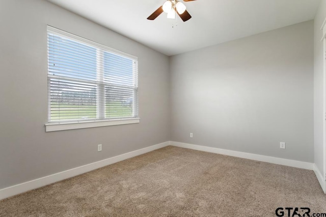 228 Smith Cir, Lindale, TX 75771 - carpeted spare room with a ceiling fan and baseboards