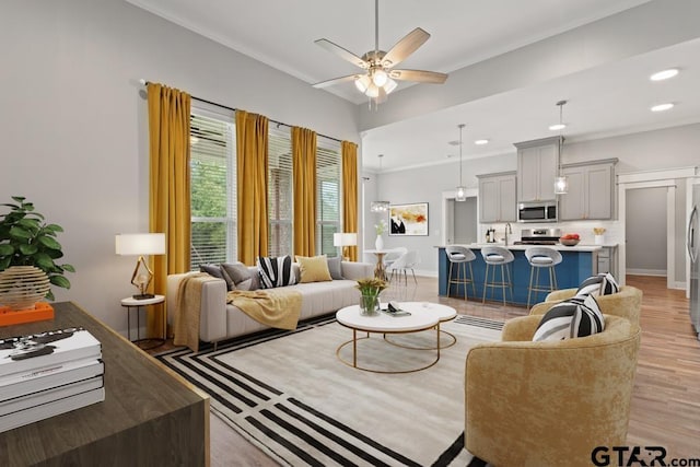 228 Smith Cir, Lindale, TX 75771 - living room featuring light wood-style floors, ceiling fan, and recessed lighting