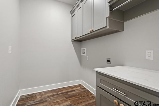 228 Smith Cir, Lindale, TX 75771 - laundry area featuring hookup for a washing machine, dark wood finished floors, cabinet space, and electric dryer hookup