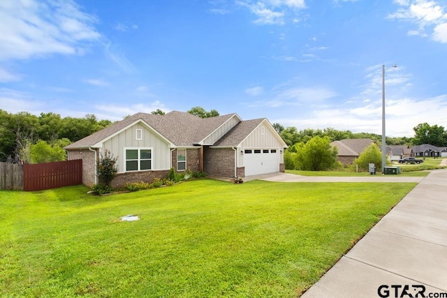 228 Smith Cir, Lindale, TX 75771 - view of front of home with board and batten siding, driveway, a garage, brick siding, and a shingled roof