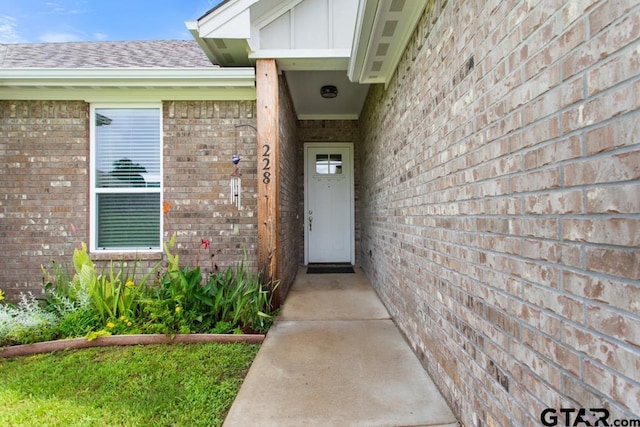 228 Smith Cir, Lindale, TX 75771 - entrance to property with brick siding and board and batten siding