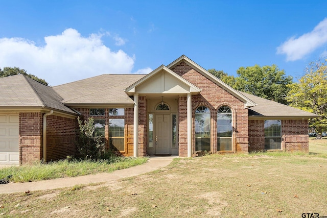 view of front of home with a front yard