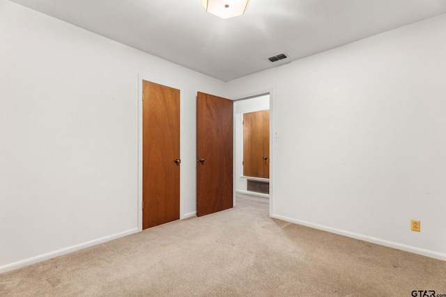 616 Golfcrest Dr, Longview, TX 75604 - carpeted empty room with baseboards