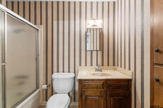 616 Golfcrest Dr, Longview, TX 75604 - bathroom with wallpapered walls, vanity, and shower / bath combination with glass door