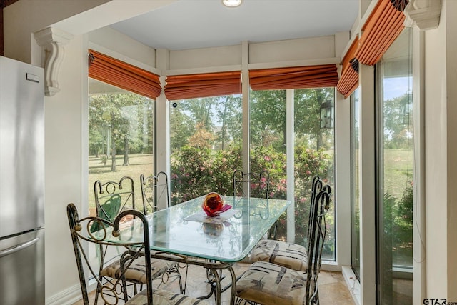 sunroom / solarium with a healthy amount of sunlight