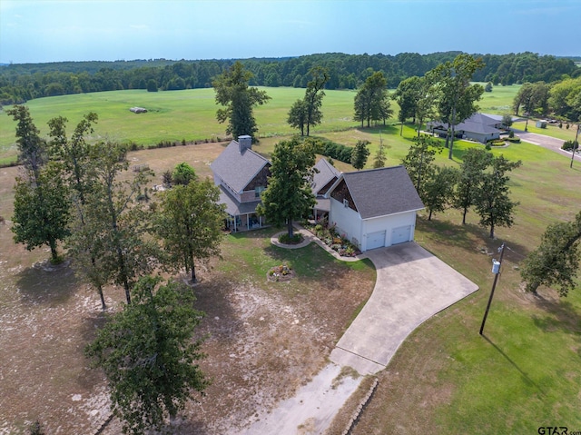 birds eye view of property featuring a rural view